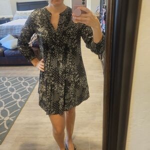 Long sleeve above the knee black dress with paisley floral pattern